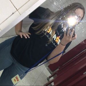 black thrasher shirt with alternating letters